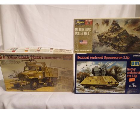 Three 1/72 scale military related plastic kits, including U.M heavy anti aircraft rail mounted gun, appear complete/unchecked