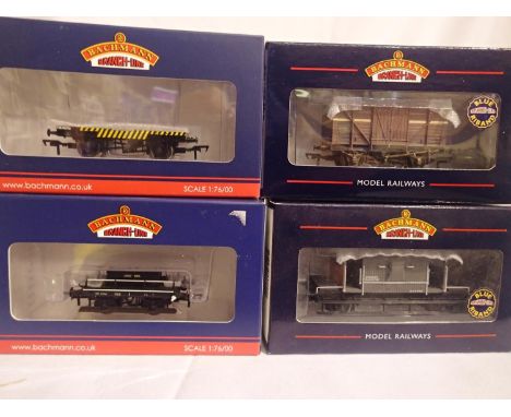 Four OO scale Bachmann wagons including Kernow and T.m.c exclusives, all in excellent condition, wear to boxes. P&amp;P Group