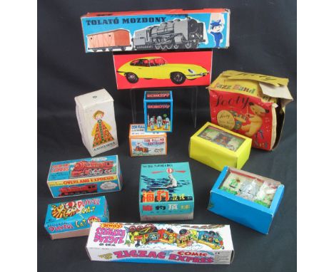 Collection of British, European and other tinplate clockwork and friction powered toys, all in original boxes, to include: To