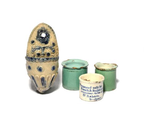 Three ointment pots, 18th and19th centuries, two delftware and decorated in a greenish turquoise glaze, the last pearlware an