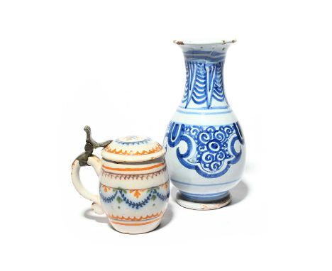 A small French (Nevers) faïence vase, late 18th century, decorated with a blue spearhead band, the neck with stylized stiff l