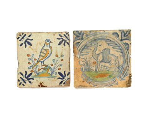 A Pickleherring delftware paving tile, early 17th century, painted in blue, green and ochre with a camel within a circular pa