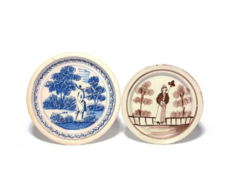 A Bristol delftware plate, c.1730, of primitive shape, painted in manganese with a standing Chinese figure flanked by sponged