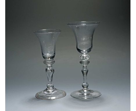 A light baluster wine glass, c.1740, the bell-shaped bowl raised on a composite baluster stem with a teared knop over collar 