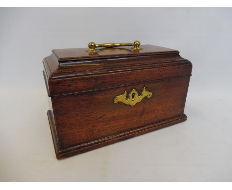 A George III mahogany tea caddy with brass handle.
