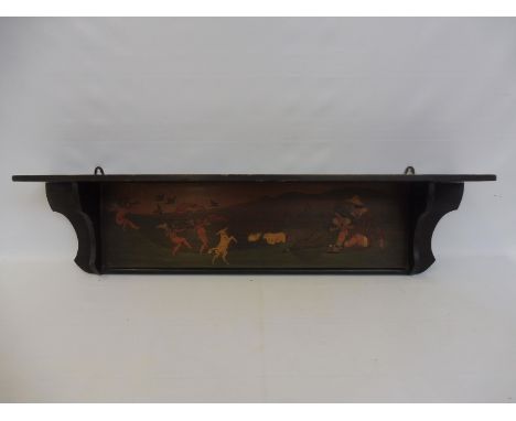 Liberty &amp; Co. - a polychrome poker work wall shelf, 37 1/2 w x 9" h x 5" d.