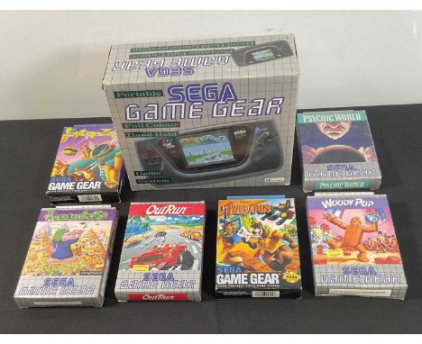 SEGA GAME GEAR - A boxed Sega Game Gear console in original box and packaging together with a group of six boxed and complete