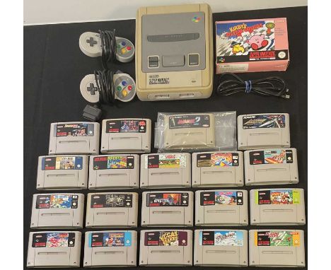 SUPER NINTENDO (SNES) - An unboxed SNES games console (PAL Version) and 2 loose controllers, together with a boxed and comple