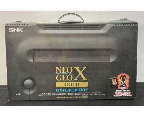 Neo Geo X Gold Limited Edition console comprising Docking Station preloaded with 20 Neo Geo AES games, Handheld Console, Arca