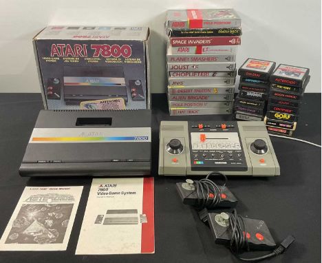 ATARI - A boxed ATARI 7800 console with 2 controllers and instructions and a quantity of boxed and loose Atari video game car