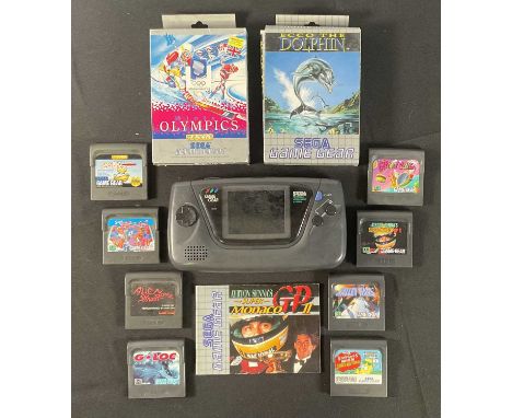 SEGA GAME GEAR - A Sega Game Gear games console together with a group of boxed and unboxed video games ECO THE DOLPHIN and WI