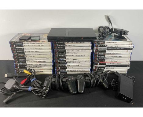 PLAYSTATION 2 - A PlayStation 2 Slim line console with 2 controllers and cables, 2 memory cards and the Eye Toy camera togeth