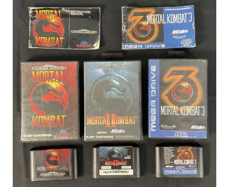 SEGA MEGA DRIVE - A group of three Sega Mega Drive games, MORTAL KOMBAT 1, 2 and 3 (1993-1994) boxed, 1 and 3 complete with i
