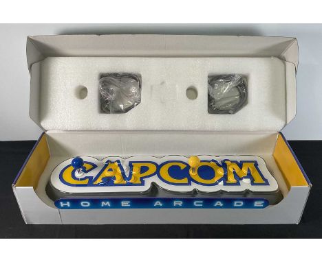 A CAPCOM HOME ARCADE games console including 16 classic arcade games, Street Fighter II, Ghouls and Ghosts, Darkstalkers, Str