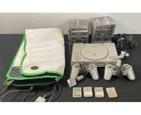 SONY PLAYSTATION 1 - A PlayStation bundle comprising of Sony PlayStation 1 console with 2 controllers and cables, a dance mat