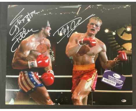 A 16" x 20" photographic still from ROCKY IV signed by SYLVESTER STALLONE and DOLPH LUNDGREN, with digital certificate of aut