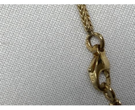 9ct yellow gold necklace hallmarked 375, with cross over design of ruby and diamonds approx. overall length 17”, approx. weig