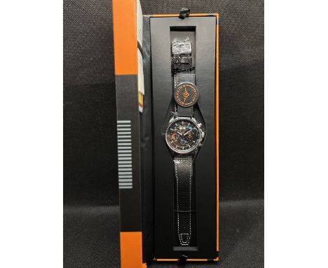 A Stührling “Ace Aviator 923.03” wristwatch, with black leather stap, black face with blue details, water resistant 30M, with