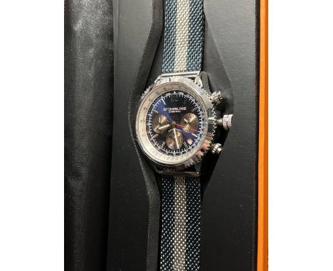 A Stührling “Monaco 3976.2” wristwatch with a blue dial and blue and stainless-steel bracelet, water resistant 50M, luminous 