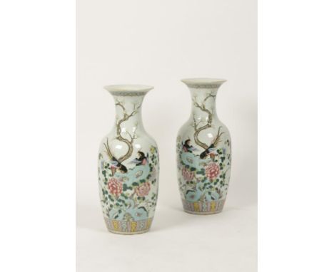 A PAIR OF CANTONESE PORCELAIN LARGE VASES each of baluster shape painted with pairs of pheasants amongst rocks amongst peonie