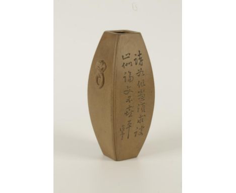 A CHINESE YIXING ZISHA VASE WITH INCISED CALLIGRAPHY of swollen slab side form, decorated with rocks and calligraphy, moulded