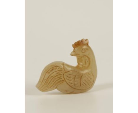 A CHINESE CELADON JADE SMALL CARVED COCKEREL PENDANT with head turned over its back, incised plumage, 4.5cm long. Condition r
