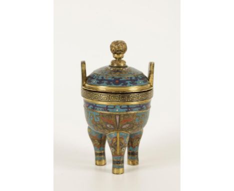 A CHINESE CLOISONNE ENAMEL TRIPOD CENSER AND COVER, the domed cover worked with dissolved dragons and taotie, dragon in cloud