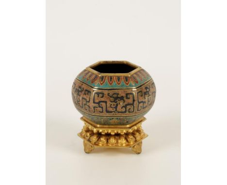 A CHINESE CLOISONNE ENAMEL HEXAGONAL BRUSH WASHER with leaf tip rim over dragon girdle band, on integral lotus petal indented