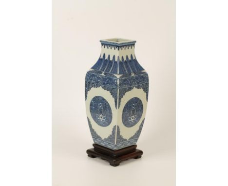 A CHINESE BLUE AND WHITE PORCELAIN VASE of baluster square section, each side painted with a Shou motif within leiwen, dragon