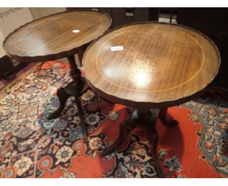 Pair of mahogany tripod side tables with piecrust edging