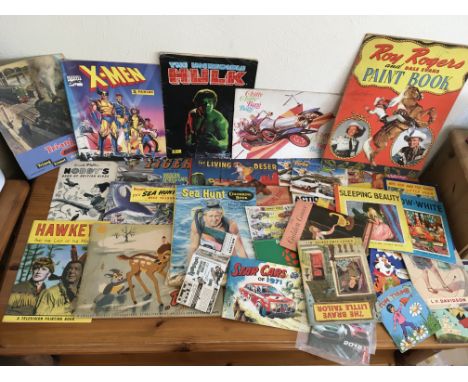 A box containing a collection of vintage children's colouring books, Sticker albums, Sweet card collections, toy catalogs, st