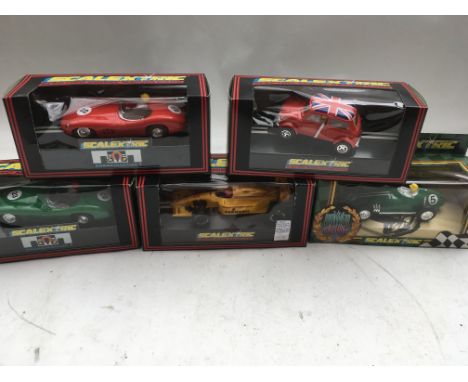 Scalextric, a collection of boxed cars, including mini, Aston Martin DBR (Red), Aston Martin DBR (green), Pennzoil Lola Chevy