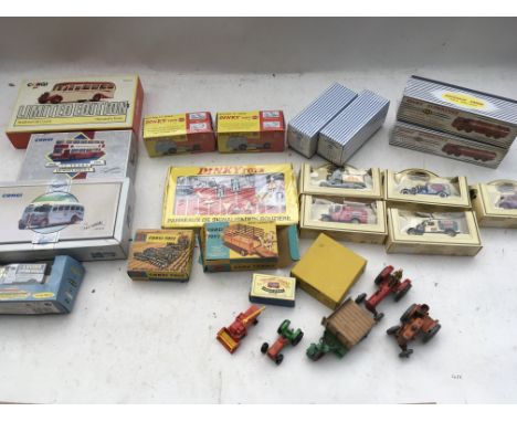 A box containing a collection of boxed Diecast vehicles including Corgi, Atlas Dinky, Lledo and loose Dinky toys etc