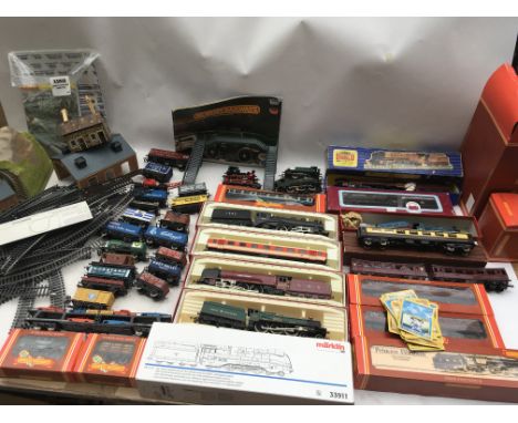 A collection of OO scale railway, including locomotives, carriages and rolling stock, also included are trackside accessories