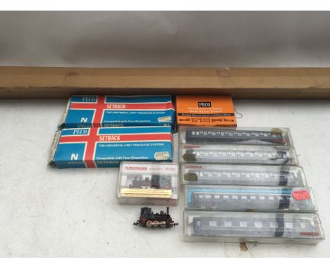 Fleischmann N gauge locomotives and carriages with a collection of boxed and loose track