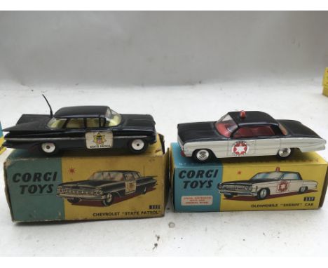 Corgi toys, Original boxed Diecast vehicles including #223 Chevrolet state patrol car, box missing end flap and #237 Oldsmobi