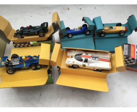 Scalextric, a collection of boxed racing cars including Porsche 917, 6 wheel Tyrell, Lotus MK4, Ferrari GP, BRM and a Porsche