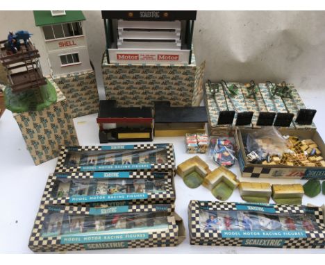 Scalextric, a box containing trackside accessories including a boxed Grandstand, Cotrol tower, TV camera crew and tower, 4 bo