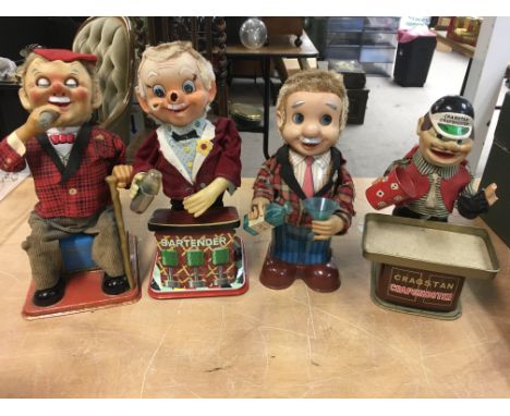 A collection of 4 A/F battery operated automaton including The Cigar smoker, Bartender, Drinks pourer and Cragstan Crapshoote
