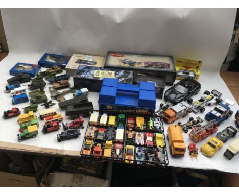 A collection of boxed and loose Diecast vehicles including Matchbox, Corgi etc