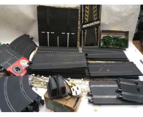 Scalextric, a collection of boxed and loose track , including Chicanes, lap counter, curves , Straight's, paddocks etc
