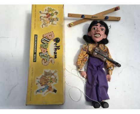 Pelham puppet, boxed, SL 16, Guitarist, looks a bit like George Harrison , is it ?, needs restringing.
