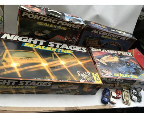 Scalextric collection includes boxed sets , Night stages racing set C850, Grand Prix racing set C698, Pontiac power racing se