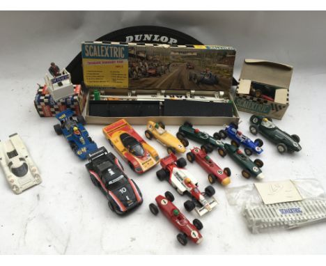 Scalextric, a box containing a collection of loose cars, a boxed Trackside accessory pack , a boxed starter man on Rosten etc