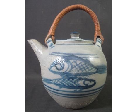 WINCHCOMB EARTHENWARE POTTERY MICHAEL CARDEW DESIGN GLOBULAR TEAPOT with caned handle and cover, painted with overglazed blue