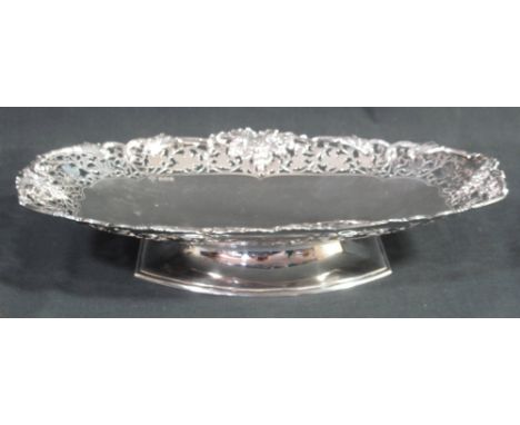 MID 20TH CENTURY SILVER PEDESTAL CAKE BASKET having pierced foliate rim with trailing vine and berries by James R Ogden &amp;