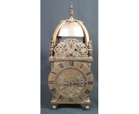 17TH CENTURY STYLE BRASS LANTERN CLOCK the face engraved William Gray, London, having steel bell above dolphin pierced pedime