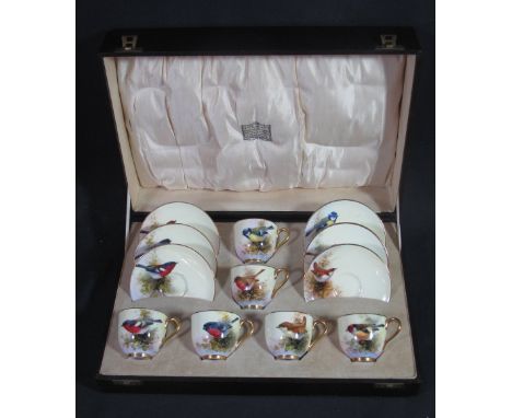EARLY 20TH CENTURY ROYAL WORCESTER PORCELAIN 12 PIECE COFFEE CUP AND SAUCER SET, hand painted with British birds and signed b