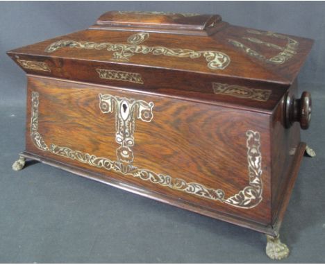 19TH CENTURY ROSEWOOD MOTHER OF PEARL INLAID SARCOPHAGUS SHAPED TEA CADDY the hinged cover revealing two inner caddies with c