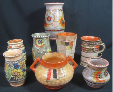 A COLLECTION OF EIGHT CROWN DUCAL TUBE LINED POTTERY ITEMS by Charlotte Rhead of baluster, ovoid and Art Deco form, to includ